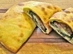 Calzone with Escarole and Calabrian Sausage