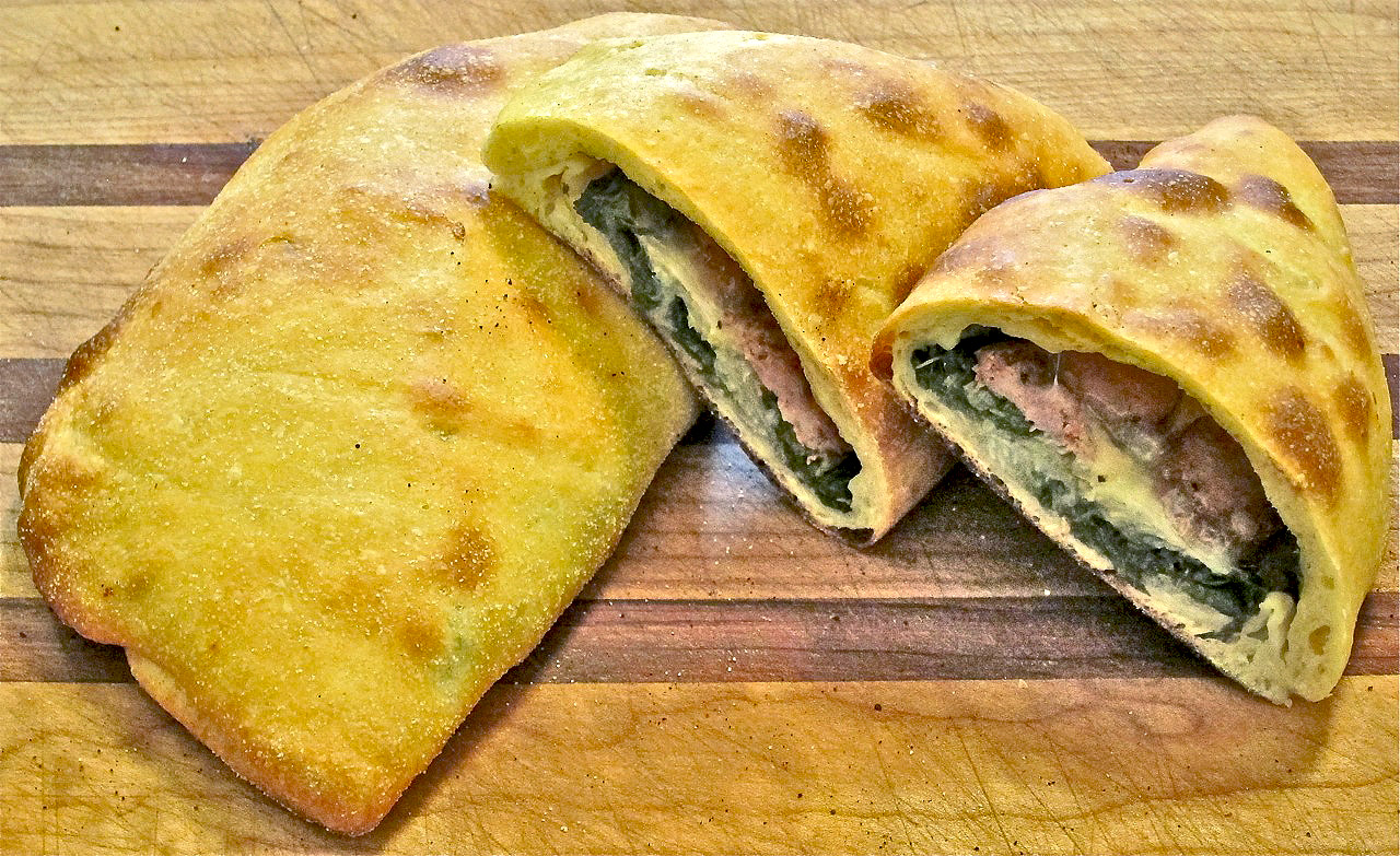 Calzone with Escarole and Calabrian Sausage
