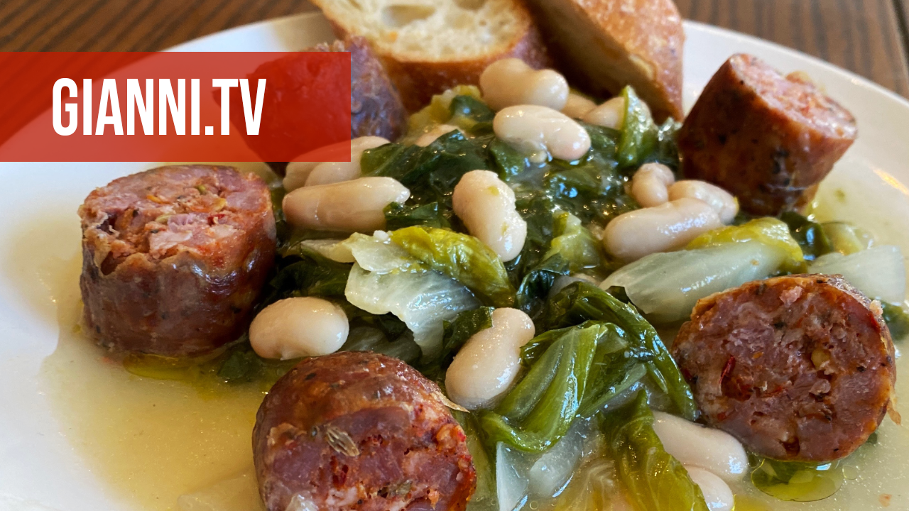 A plate with escarole, beans & sausage